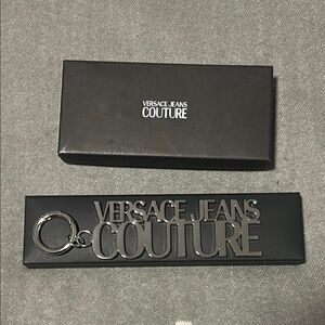 -*New in Box* $200 Versace Jeans Couture Silver Keychain / Bag Charm